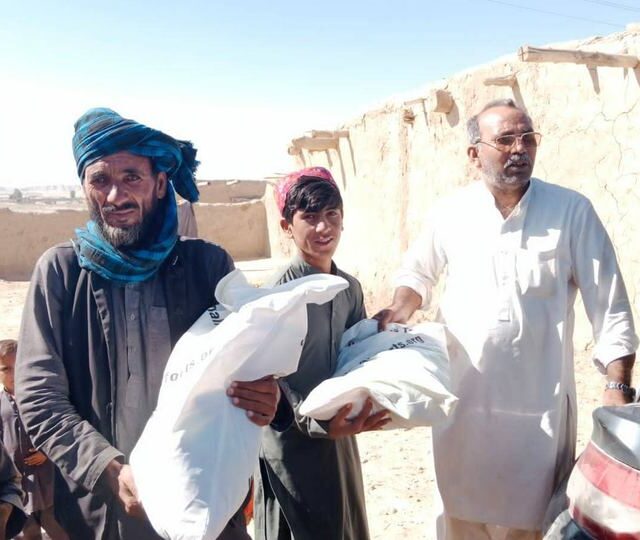 Ration sacks handed to a household during flood relief