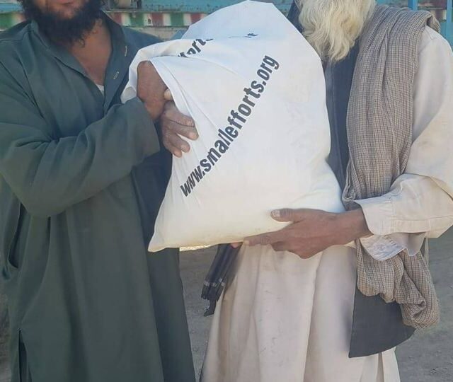 Relief supplies reaching a village