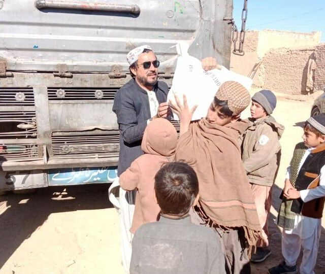 Unloading relief supplies from the truck