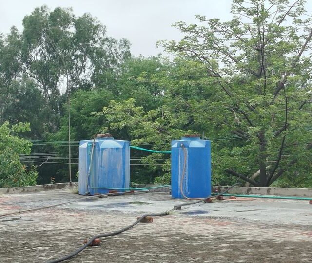 Water tanks supplying the building